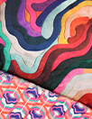 Dutch 'rainbow swirl' reversible plush fur - Oeko-Tex Cert.